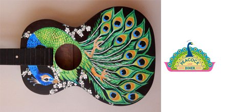Almost too pretty to play...
#GuitarMonth #peacockart