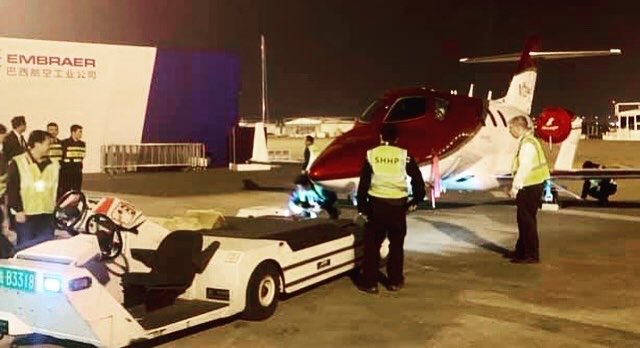 NBAA's tweet photo. It’s nearly midnight in Shanghai and the last aircraft is leaving the #ABACE19 static display. Thanks to everyone who helped make the show a success! https://t.co/OyjpQdjtQW