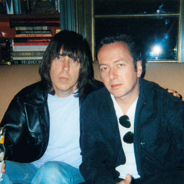 johnnyramone's tweet photo. “Johnny loved @TheClash. He thought they were the 2nd best punk band of all-time, behind the @RamonesOfficial.” -@lindaramone 

#PunkRockThrowback: Taken in April of  '02, Johnny &amp; Joe Strummer pose together for a candid shot. #FriendshipGoals #JohnnyRamone #JoeStrummer #TheClash https://t.co/7rNLa1y9NC