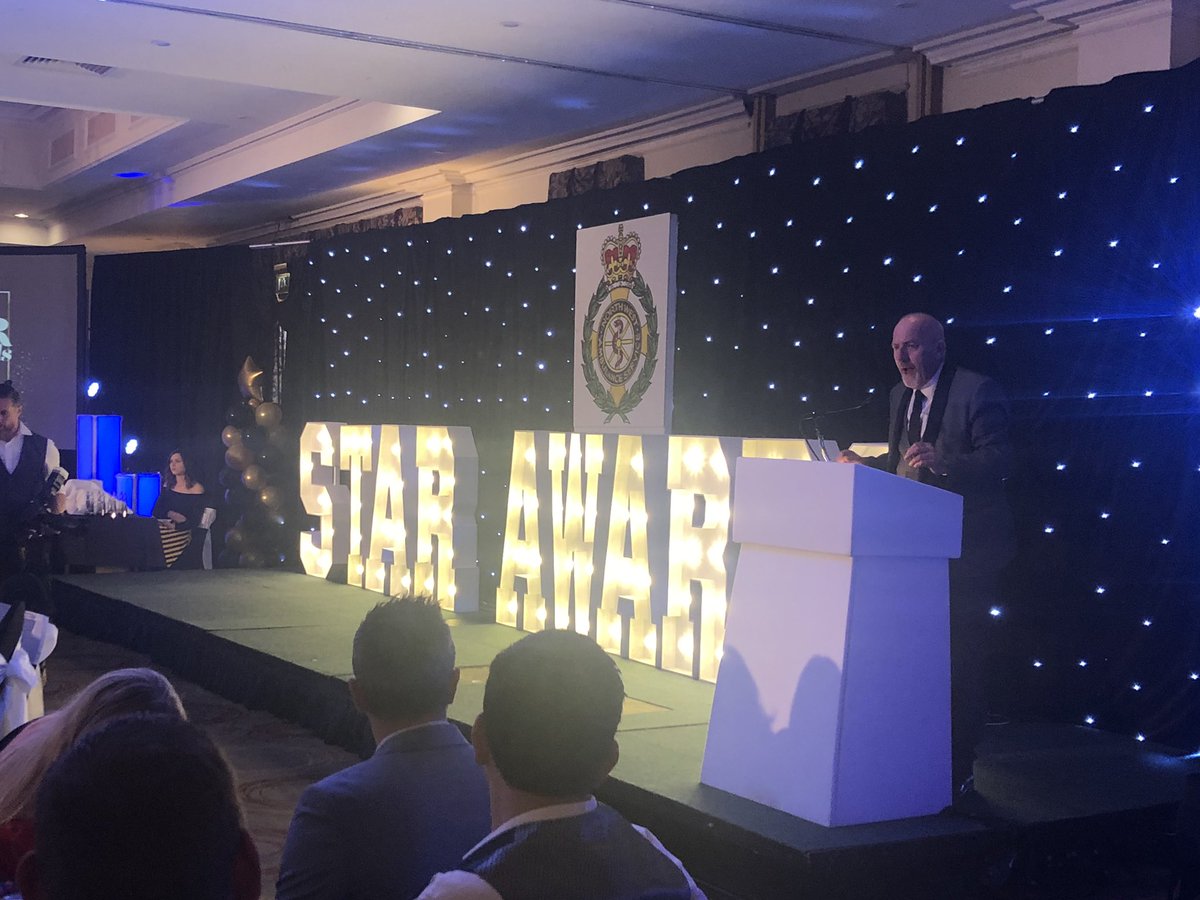 NWAmbulance's tweet photo. Friend of the ambulance service, @CroneyITV takes to the stage to host tonight's proceedings 🎤. Ambulance jokes in full swing 🤣 #STARAwards19 https://t.co/VMqo8TZzGM