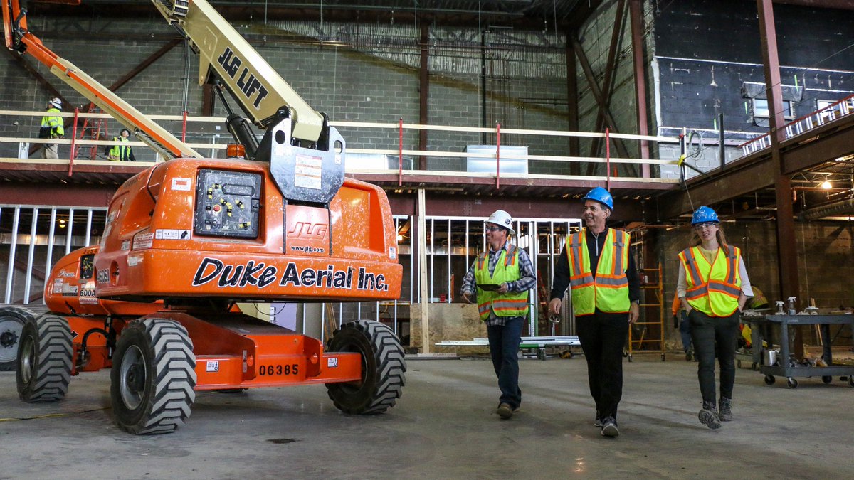 KUVolleyball's tweet photo. The #KUvball coaching staff visited the Horejsi Family Volleyball Arena to see the progress on their new facility today 🔽

📸: https://t.co/l8XVJyIjoY https://t.co/sOtZy6WarC
