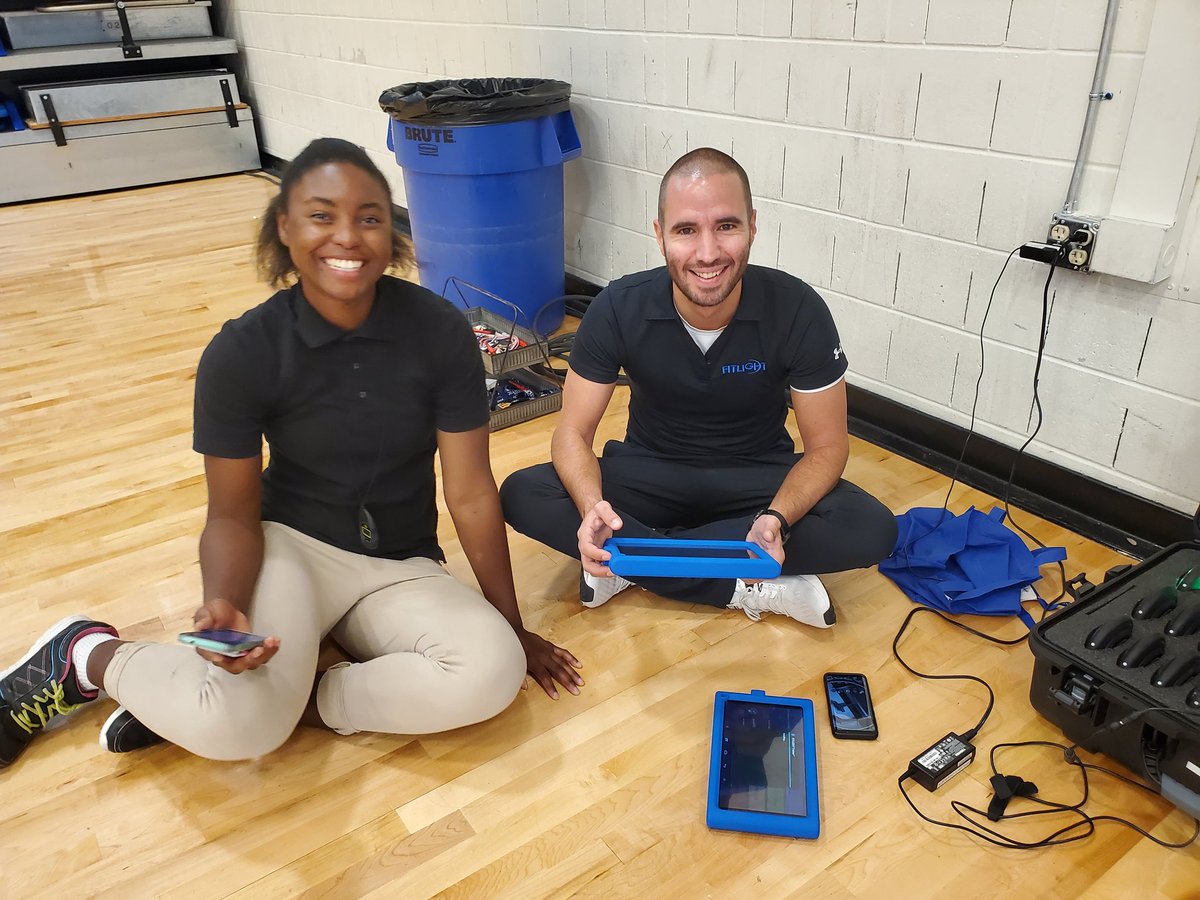 FAUExercise's tweet image. Sigourney Kame, FAU exercise science major, learns more details from Rob Bouw, sales for Fitlights. We used them with our FAU Well Program older adults. #fitlight #fau