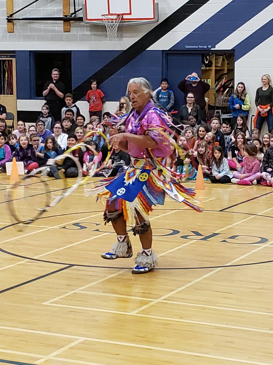 MisterBurk's tweet photo. Father Gerard and St. Greg's blessed by the gift of music, story telling and hoop dancing of indigenous performer Kevin Locke.  #ecsrdJOY @SuperECSRD @EvergreenMike @EtiennaLafferty https://t.co/cs0Nr7WP2J
