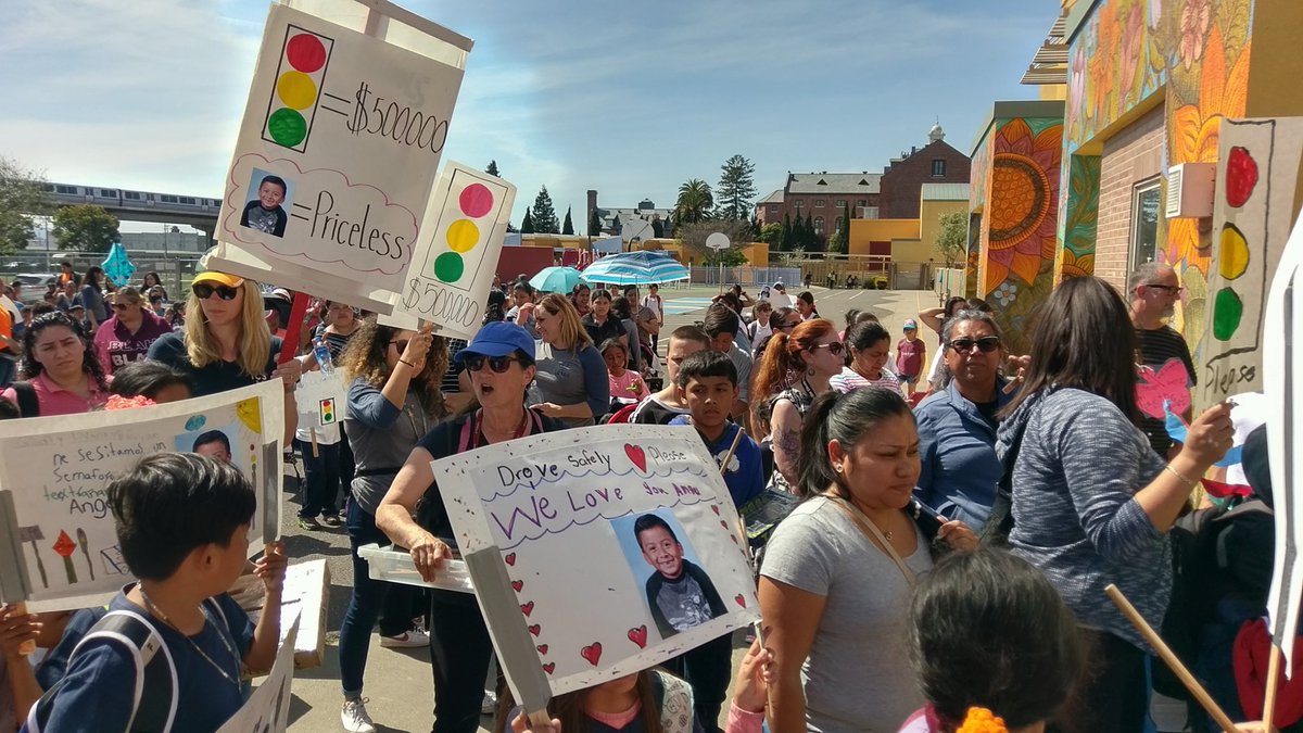 RadioEli's tweet photo. March in Oakland for Angel and Alma Garcia-Vasquez, kindergartner and mother killed in a hit and run. https://t.co/yGEqDylo6x