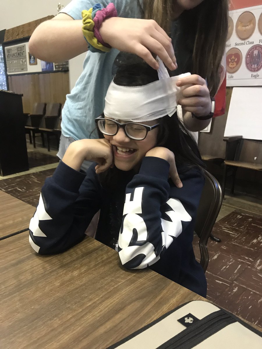 Girls in BSA Troop 39 learn how to care for basic head injuries. First Aid