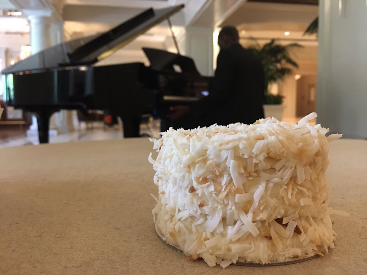 familyonabike's tweet photo. Charleston’s famous flaky coconut cake, served with smooth cocktail piano. The Perfect start to #Easter weekend #BGTWCharleston #Charlestone @HotelBennett #food @TravWriters https://t.co/1MMjDzuKnB
