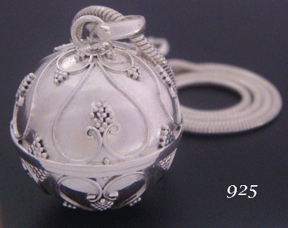 Sterling Silver Harmony Ball from HarmonyBallPendant.com adorned with raised Hearts motifs features on this #HarmonyNecklace - one of the most Popular designs in the Traditional Balinese range. #harmonyball #pregnancynecklace #jewelry #chimenecklace harmonyballpendant.com/harmony-neckla…