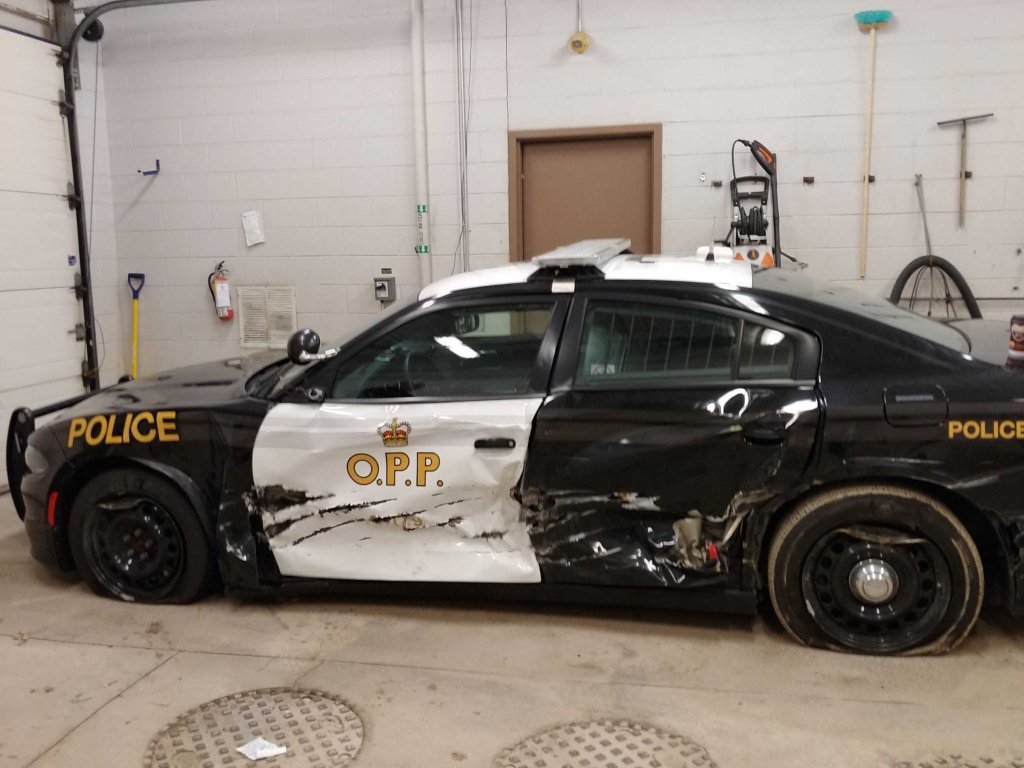 OPP_WR's tweet photo. #ElginOPP officers car sideswipe on #HWY401 yesterday near #Dutton Officer is OK but beyond upset.  Let's not let this happen again this #longweekend.  Lots of rain out there..  #Slowdown ^ac https://t.co/6kahsfzLWi