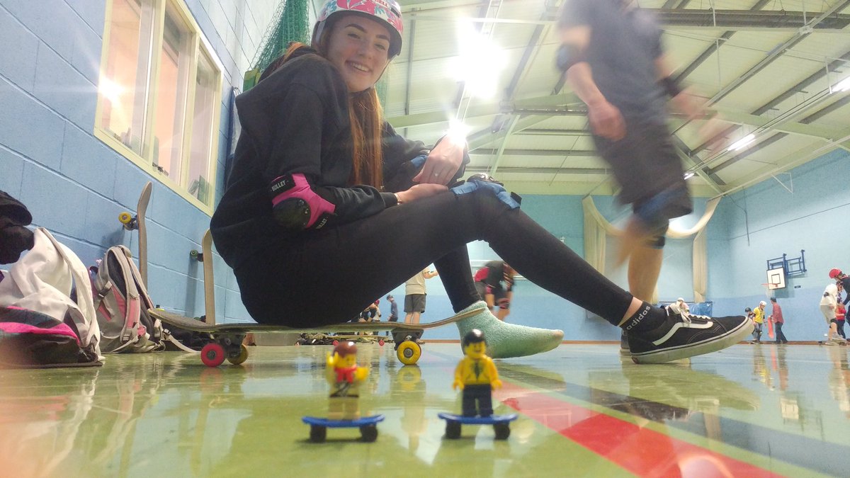 GI Joe and Colin are skateboarding with Sarah at Revoution camp