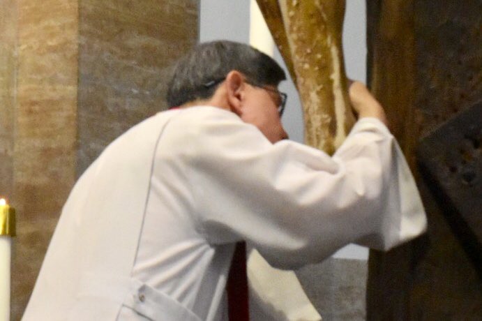 Manila Archbishop Luis Antonio Cardinal Tagle kisses the foot of the crucified Jesus at the Commemoration of the Lord’s Passion at the Manila Cathedral. April 19, 2019.