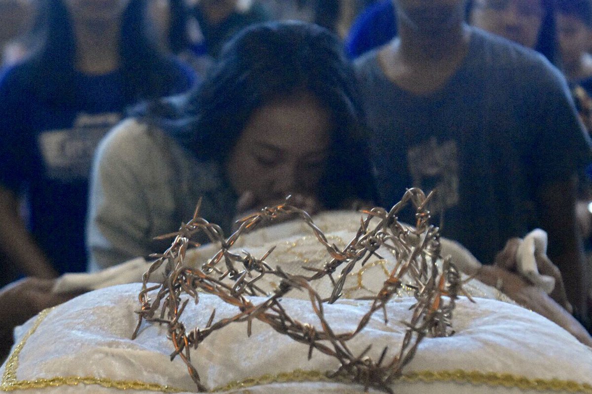 VENERATION OF THE CROSS The Catholic tradition of venerating the dead body of Jesus Christ on Good Friday after the Commemoration of the Lord’s Passion at the San Agustin Church in Intramuros, Manila for the traditional Veneration of the Cross. April 19, 2019.