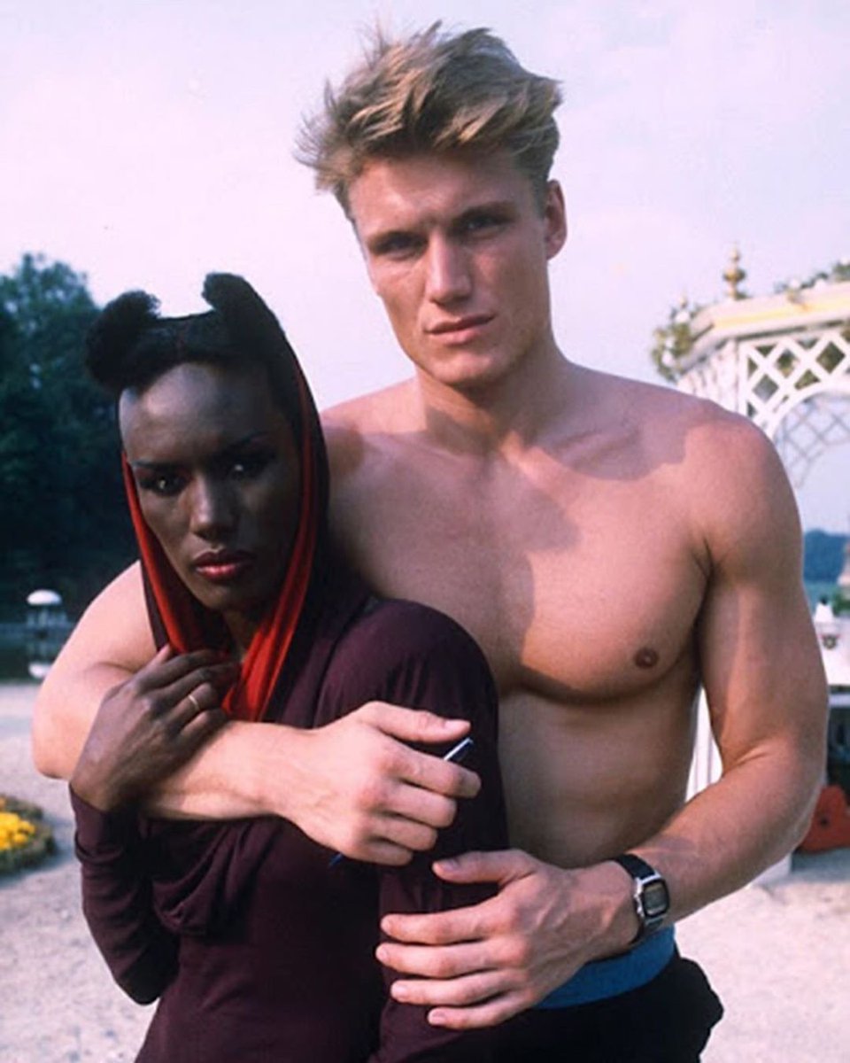Retrocokes's tweet photo. Dolph Lundgren and Grace Jones while they were a couple in the 1980s. He had earned a Masters in chemical engineering from the University of Sydney, when he was awarded a Fulbright Scholarship to the Massachusetts Institute of Technology in 1983. #Retro #Retrocoke #Moodvintage https://t.co/q8K7tgeL5H