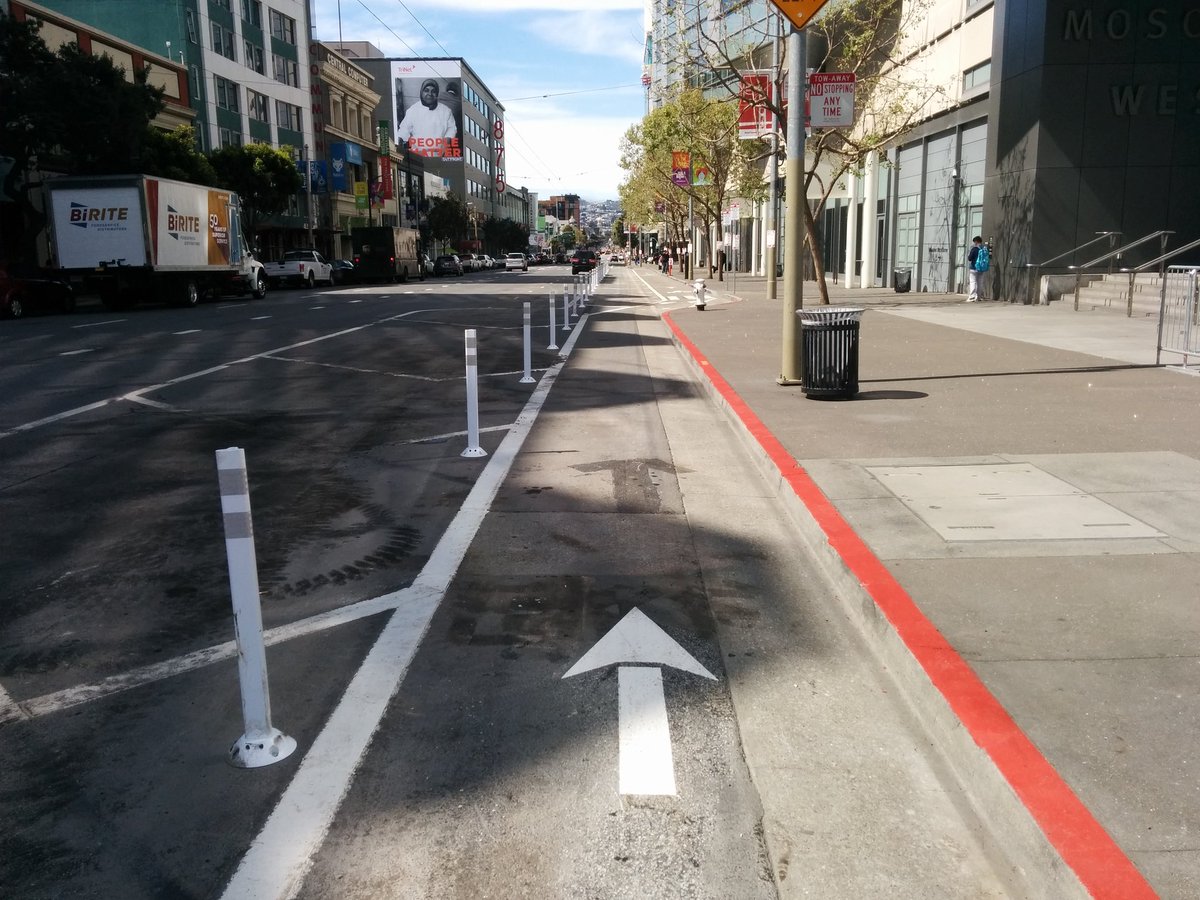 Also, the Howard St. protected lane is progressing east. Here's the new start, at 4th. Curb to posts in this initial narrow section: 6'6".