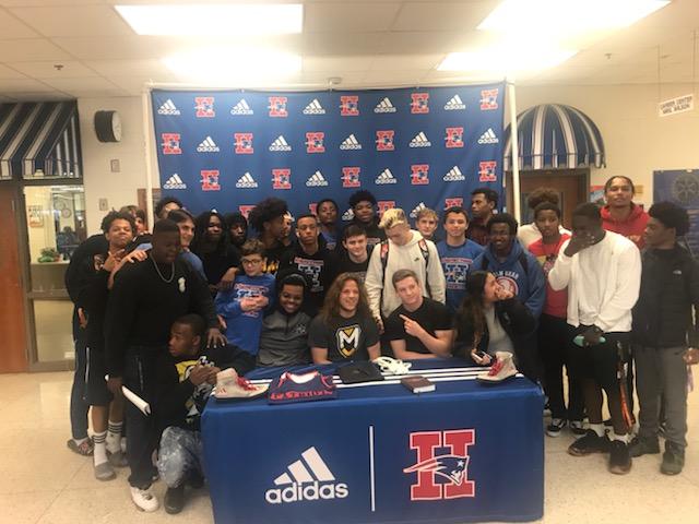 HHS_Conyers's tweet photo. Congratulations to Cameron Hooley on signing today to wrestle with @MUSpartans. https://t.co/Q4CzKmtkZe