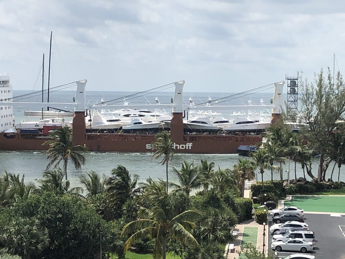 Wondering how the local economy is doing in Fort Lauderdale? Here’s a barge entering Port Everglades with a 1/4 Billion $ worth of toys on it. <a href="/VikingYachts/">VikingYachts</a> #FortLauderdale