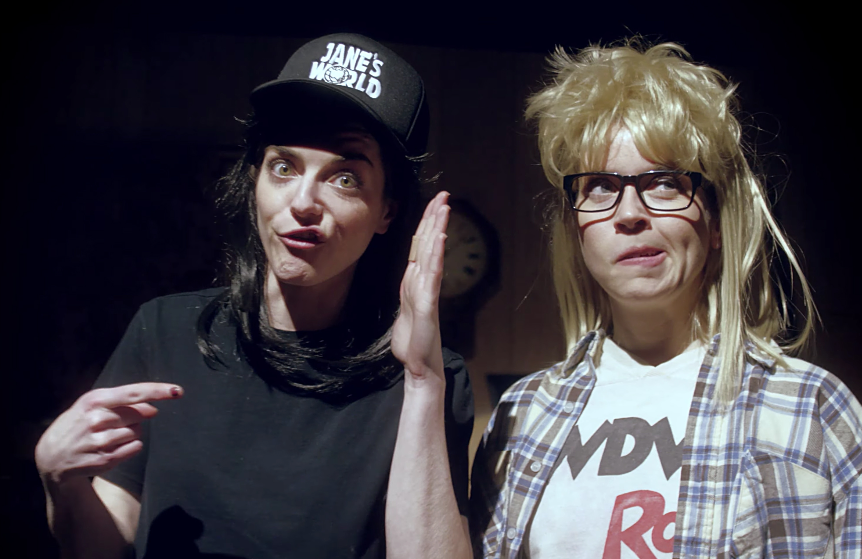 RollingStone's tweet photo. See Laura Jane Grace and the devouring mothers pay homage to #WaynesWorld in the hilarious new video for their song, “I Hate Chicago" https://t.co/6Xdl6DU0DF https://t.co/s3A8LI83iD