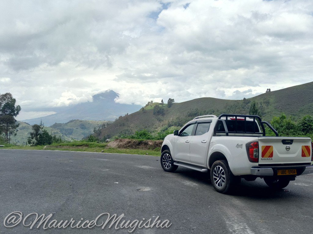 MauriceMugisha's tweet photo. Road trip to Kisoro and I decided to try my skill at photography. In the background is my ancestral village at the foot of the towering Mt. Muhabura. #Kisoro #MyUG #UgandaTourism #BeautifulUganda #Nissan #Navara https://t.co/5Ih4kWAHMG