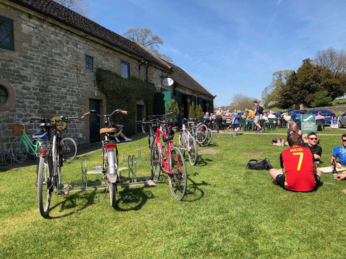 Village looking busy ⁦<a href="/TissingtonHall/">Tissington Hall</a>⁩ for The Easter weekend with cycle racks at Herberts Tearooms from ⁦<a href="/pedalpeak/">Pedal Peak District</a>⁩ #tissington