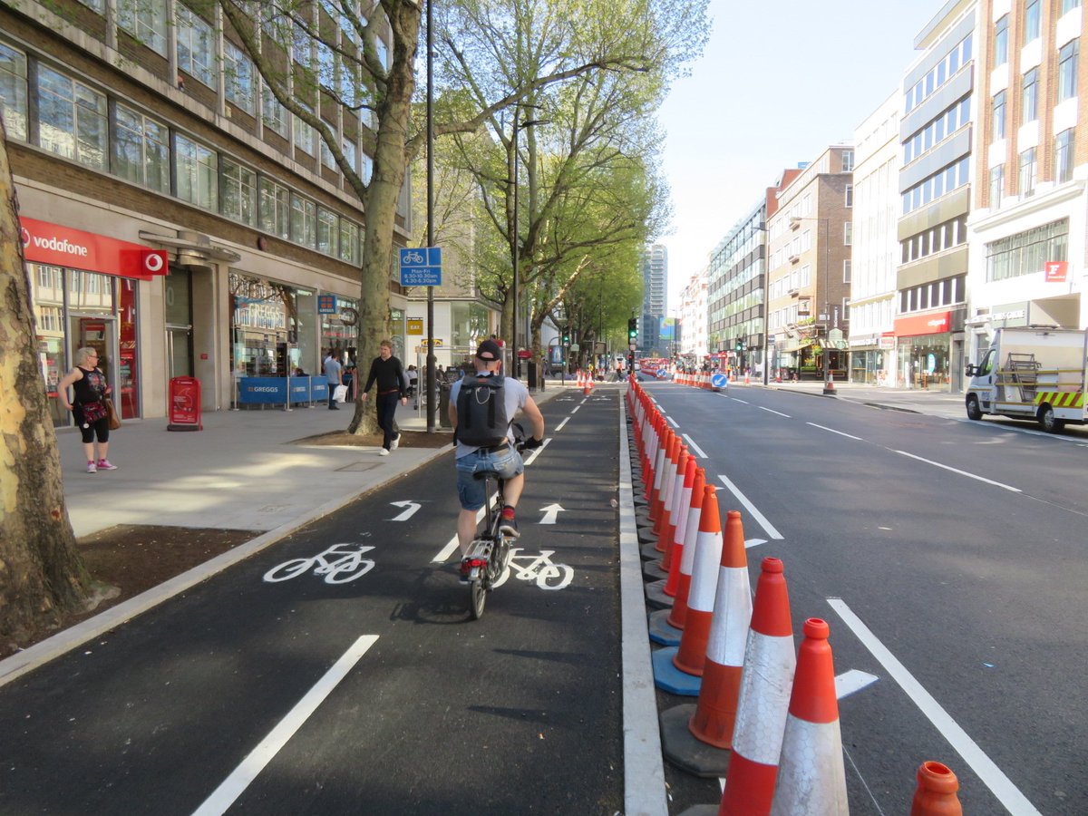 Before and after, a much upgraded cycle lane on Tottenham Court Road