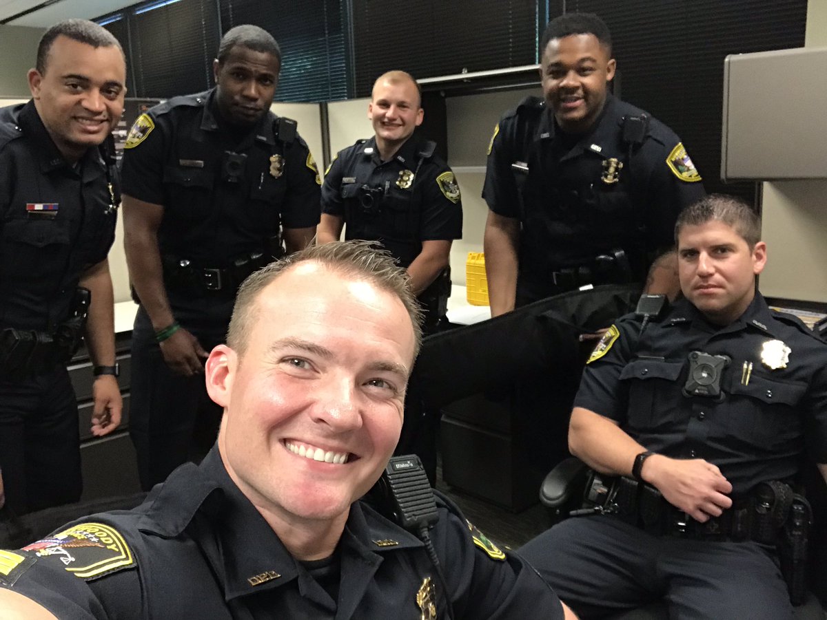 DunwoodyPolice's tweet photo. After giving it much thought, D-Team officers decided to show up for work dressed alike for #NationalLookAlikeDay (AS) https://t.co/ACfvUvMpZ0