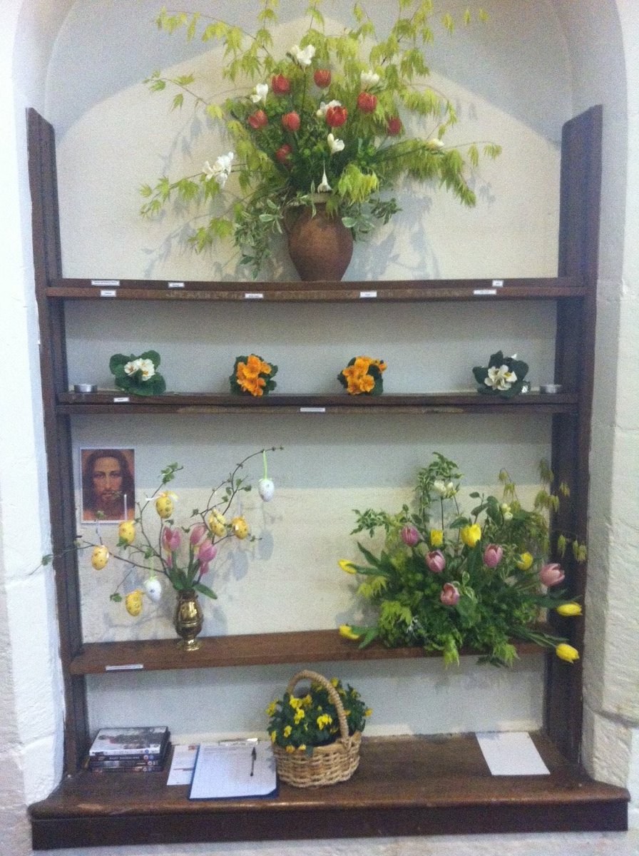 lheadparish's tweet photo. After a lively morning service it's very tranquil in #leatherhead church right now. The #Easter flowers make the building look even more beautiful despite the hazard tape! #MakingHistory1000 #explorechurches https://t.co/oKTOYGz3n2
