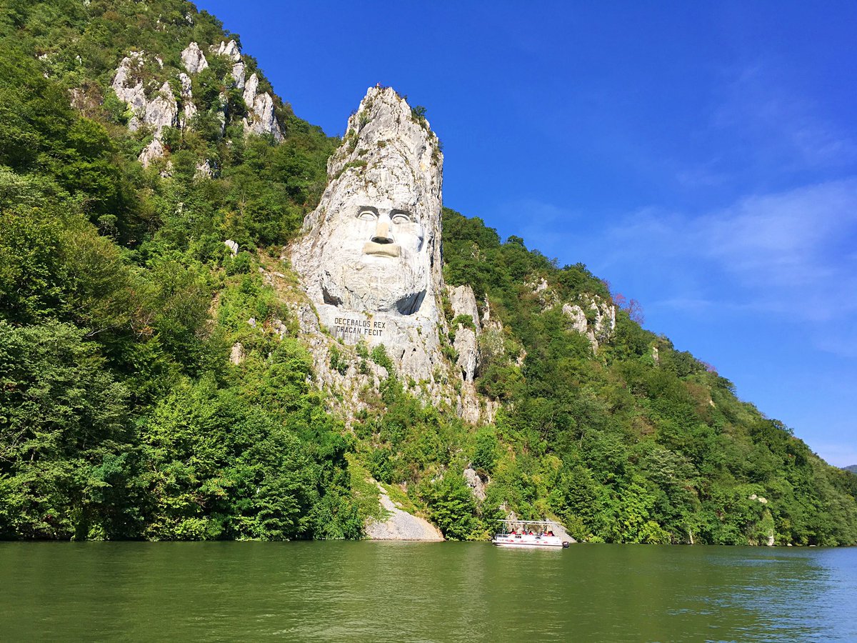 Statue of Decebal in Cazanele Dunării situated at the border between Romania and Serbia: a work yet not finished that can be best admired during a boat ride. 
#georgianastories #danube #romania #bestplacestogo #places_wow #travel_drops #living_europe #mapofeurope #travelblogger