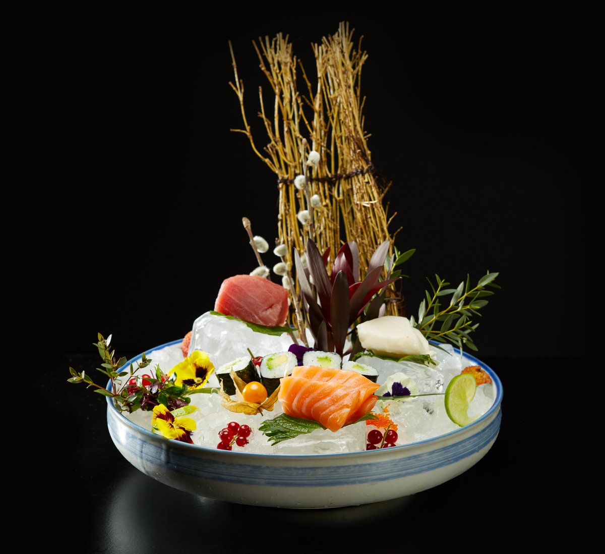 Is this a sashimi platter or a photo of a beautiful island on a distant planet? Either way, it looks delicious.