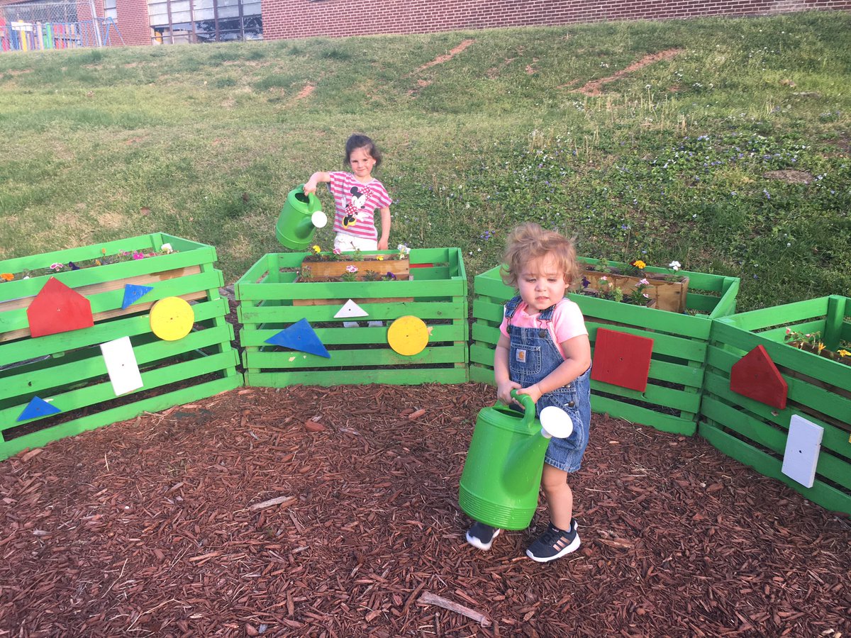 larrydowell4's tweet photo. One foot in heaven this Easter. My favorite part of the entire day was watering the flowers @Neosho_Central garden with two of my granddaughters. These girls love the caterpillar 🐛 and our garden. They are helping us with #bringingbackthebloom @NeoshoChamber @larrydowell4 https://t.co/5siSRift6j