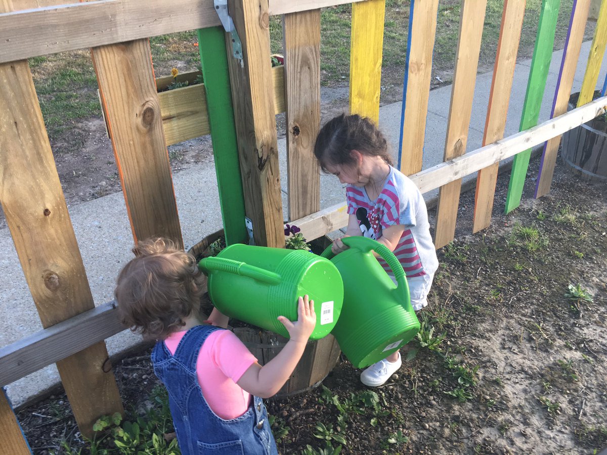 larrydowell4's tweet photo. One foot in heaven this Easter. My favorite part of the entire day was watering the flowers @Neosho_Central garden with two of my granddaughters. These girls love the caterpillar 🐛 and our garden. They are helping us with #bringingbackthebloom @NeoshoChamber @larrydowell4 https://t.co/5siSRift6j