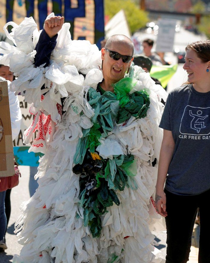 Hundreds of people participate in Earth Day parade celebration in ...