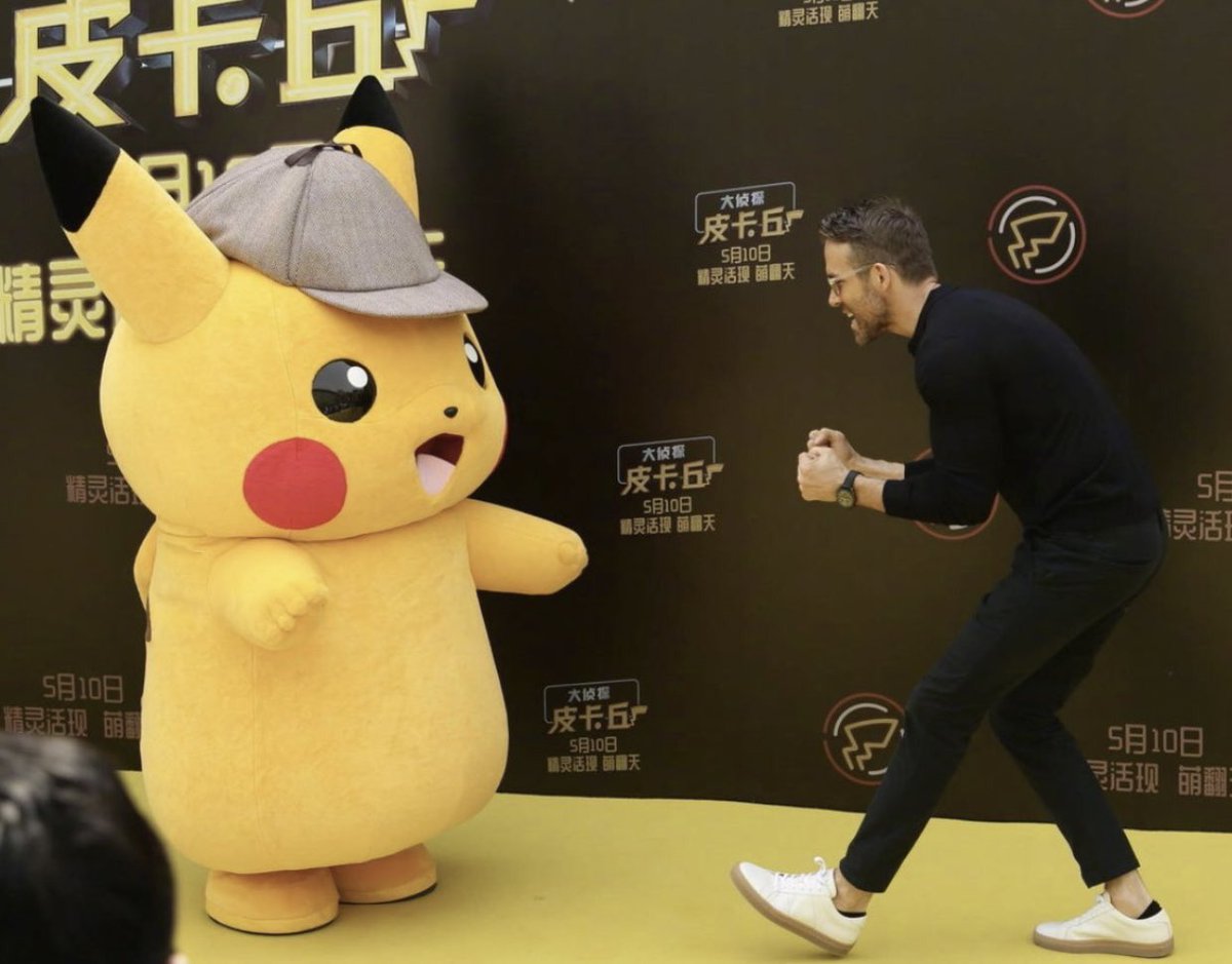 luvpillarz's tweet photo. i want someone to look at me the way ryan reynolds looks at pikachu https://t.co/DJ3P7fz7xB