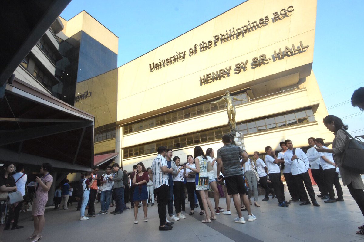 Students and guests of the University of the Philippines BGC campus and participants to the Second Disinformation and Democracy Decay Forum rushed to the open ground after an intensity 5.7 earthquake hit the metropolis at 5:11 in the afternoon, April 22, 2019.