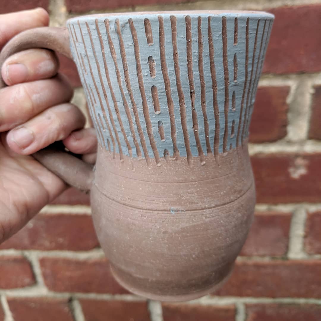 Happy Monday! I did a little #sgraffito carving over the weekend, including this #mug. Still trying to figure out how to #glaze it☕ #mugs #sgraffitopottery #mugshotmonday #bigmug #acreativedc #mydccool #madeindc #bythings #pottery #ceramics #wheelthrown #wheelthrownpottery #clay