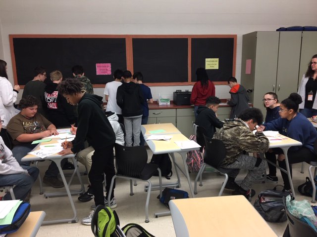 namsEnglish's tweet photo. Students in Mrs. DelPolito's 8th grade English classes practiced their poetry skills at Poetry Stations. They practiced figurative language, haikus, cinquains, diamantes, free verse, shape poems, and acrostics. @NAMS1617 https://t.co/uENVP5hMCU