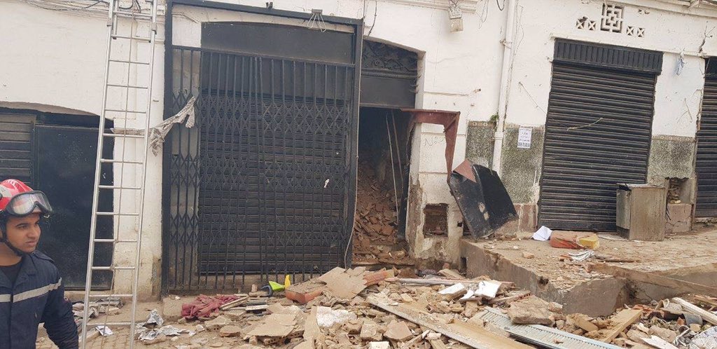 MaliaBouattia's tweet photo. The people continue to suffer from the regime’s greed. A child &amp; his father killed in a collapsed building in #casbah Algiers this morning. They should have been rehoused instead their building looks like it was given a coat of paint as part of the city’s “restoration” project https://t.co/RQKMWj9PKY