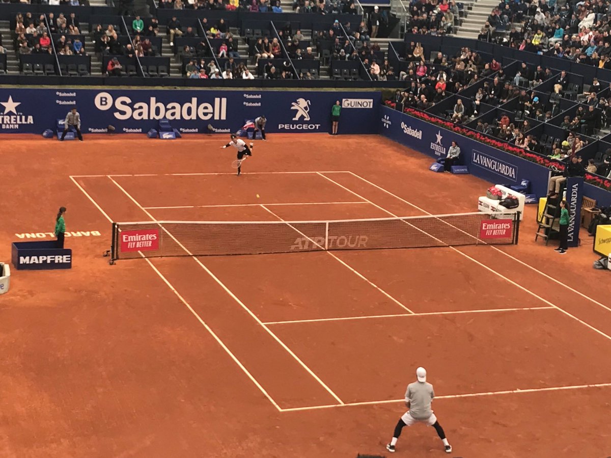 FergusDunn's tweet photo. Nice afternoon watching some tennis 🎾 @bcnopenbs with @bossiepro even needed the ☂️ a few times making it feel just like a British summer! https://t.co/m7DN50IEPr