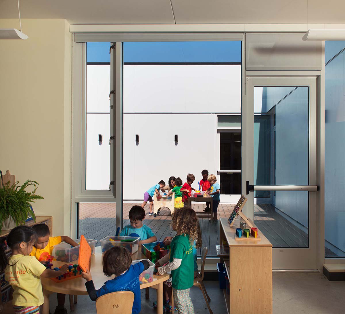 studio27arch's tweet photo. Happy Earth Day! Our LEED Platinum @MundoVerdePCS boasts proven sustainability solutions w/ a 25K gallon cistern that collects rainwater and uses it for flushing, pervious concrete pavers, + high-performance building envelope requirements warranted from stringent energy modeling. https://t.co/BMqUw3qOX9
