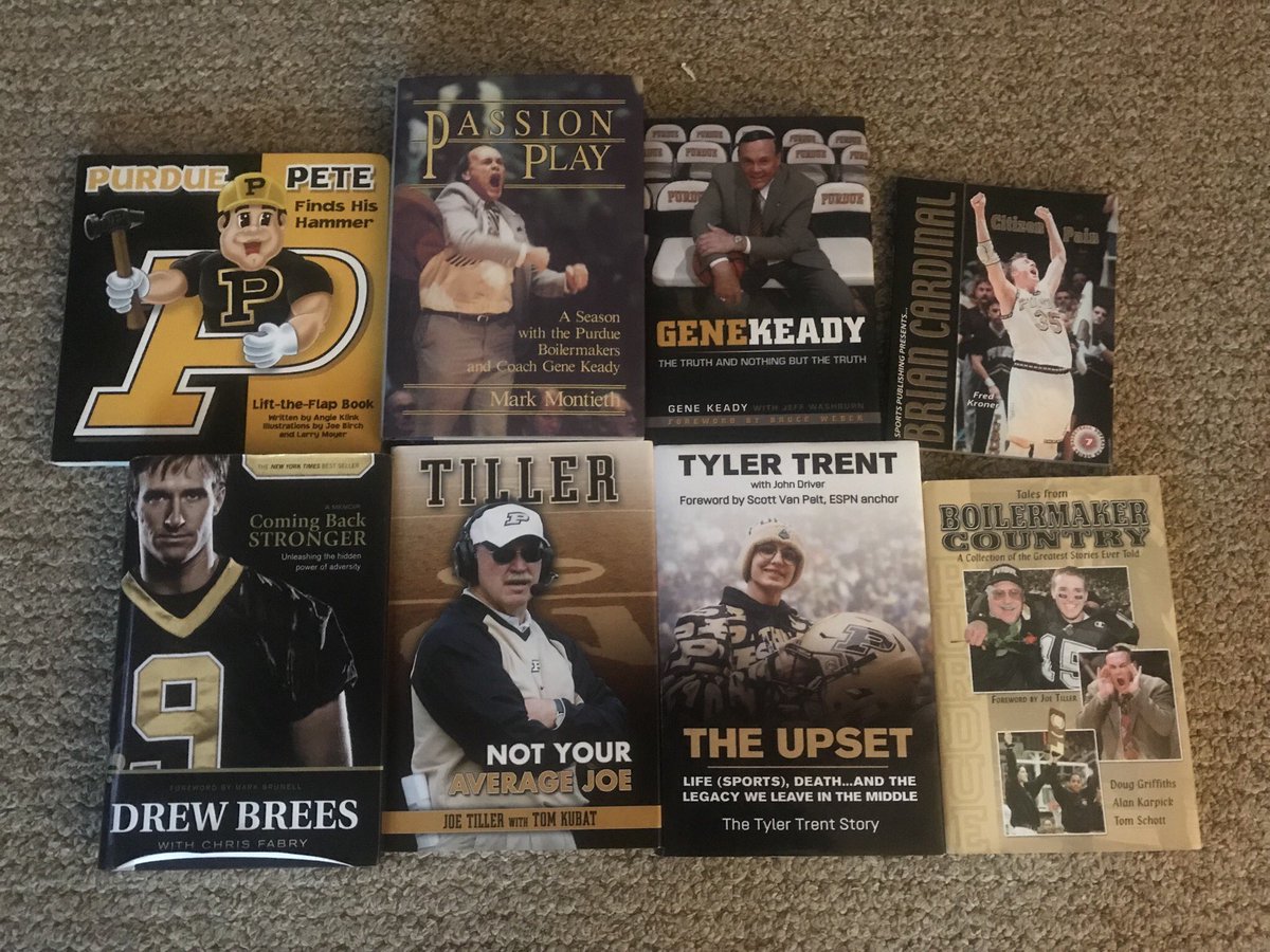Floridaboiler's tweet photo. #boilerup my #Purdue book collection is growing. #tylersytong #genekeady #joetiller #purduepete #briancardinal #drewbrees #theupset https://t.co/boES9RduKV