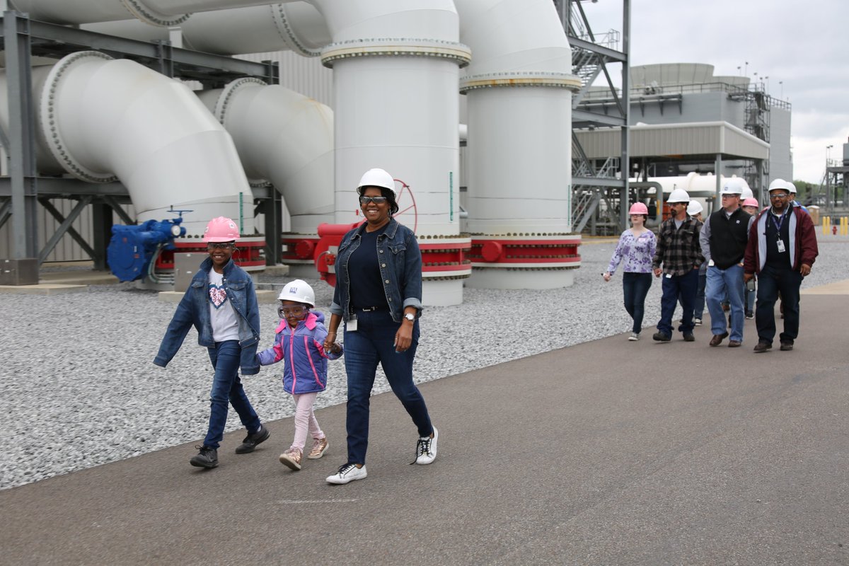 TVA_Julia's tweet photo. Donning pink hard hats, girls who attended @TVAnews Bring Your Daughter to Work Day, toured #AllenCC Plant and learned how #TVA works with @MLGW to provide reliable, low-cost power for #Memphis. Our objective was to introduce more girls to #STEM careers! #TVAGirlPower #TVAcares https://t.co/rTAs7RHgeQ