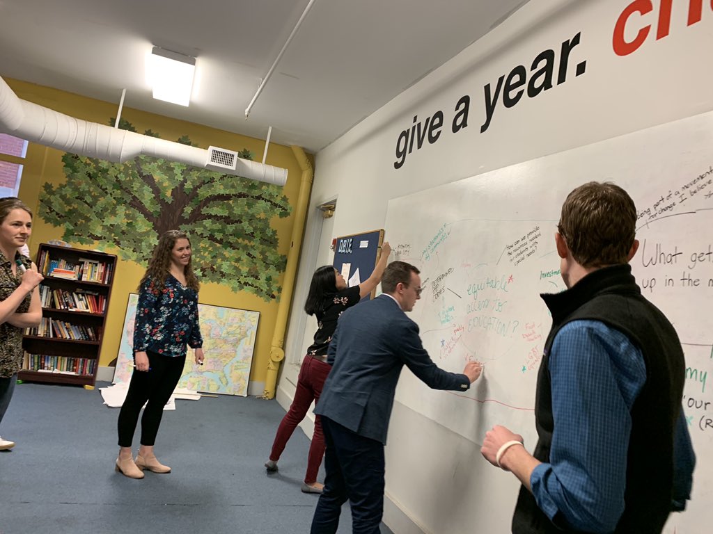 Chasten's tweet photo. Great spending time with these @AmeriCorps alums here in Manchester discussing education and the importance of national service. Thanks for humoring me with the mind map exercise! Favorite quote from our chat: “We should ask, invite, and challenge young people to get involved.” https://t.co/ejjHmWfsKk