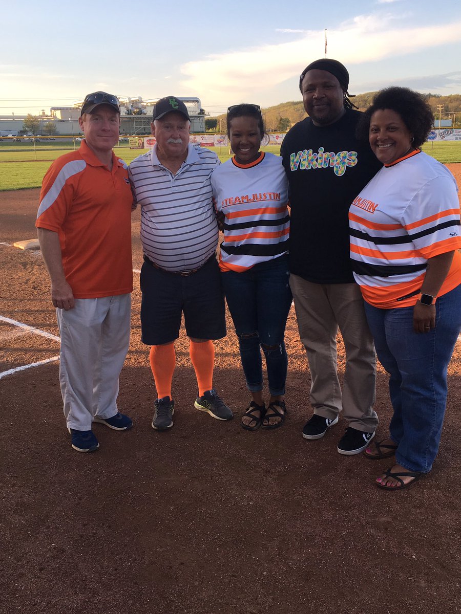 Coach Slone and Coach Ron with the Graham family tonight 🧡