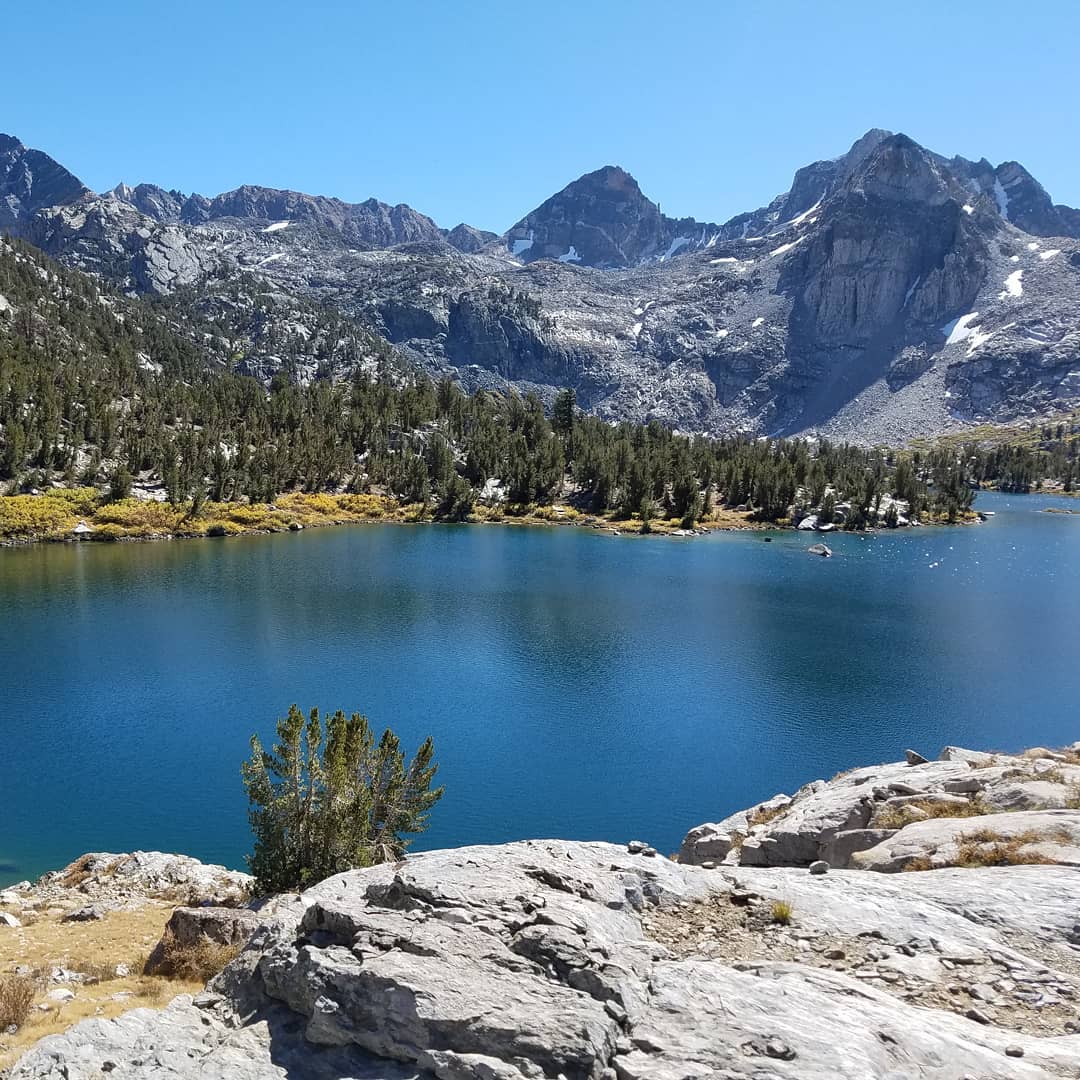 View of the lake with the mountains at the back.