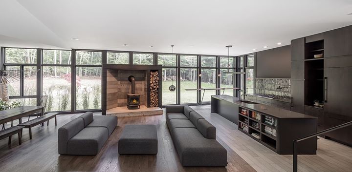 An open floor plan allows a family of musicians the space to play and entertain. A wall of Integrity Wood-Ultrex windows is as dynamic as their music. bit.ly/WoodUltrexFibe…