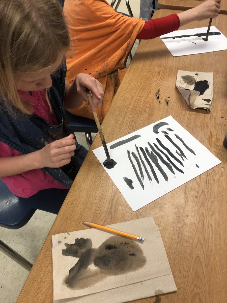 3rd grade artists practice Sumi-e ink painting techniques for their upcoming artwork! 🎨