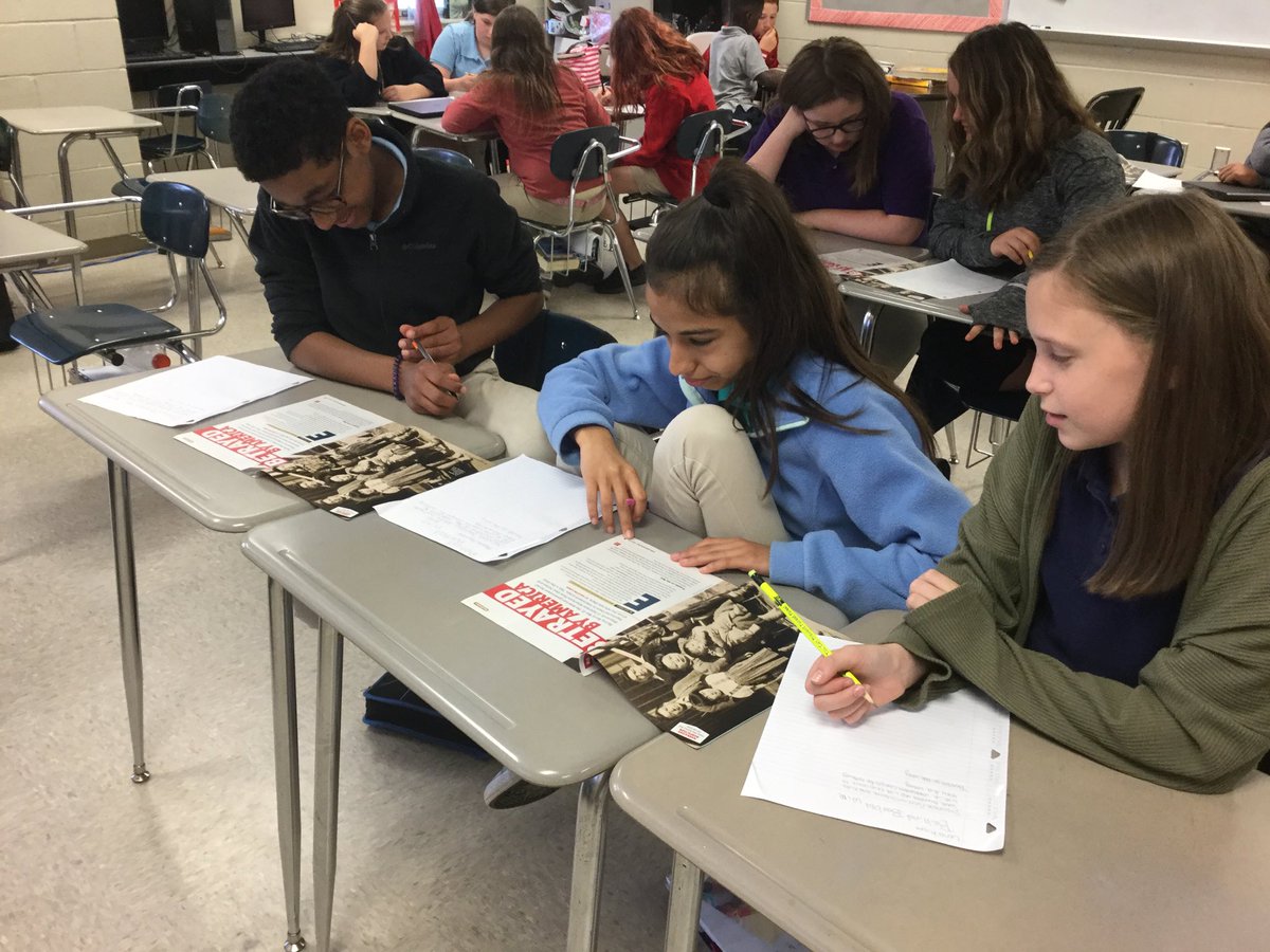 DixonMms's tweet photo. After reviewing GIST, this group of students argued over who would be the first to read the article about the Japanese American internment camps during WWII! ⁦@TCBOE⁩ ⁦@MunfordMiddleAL⁩ #MMSstrong https://t.co/mzkyk0I6Yl