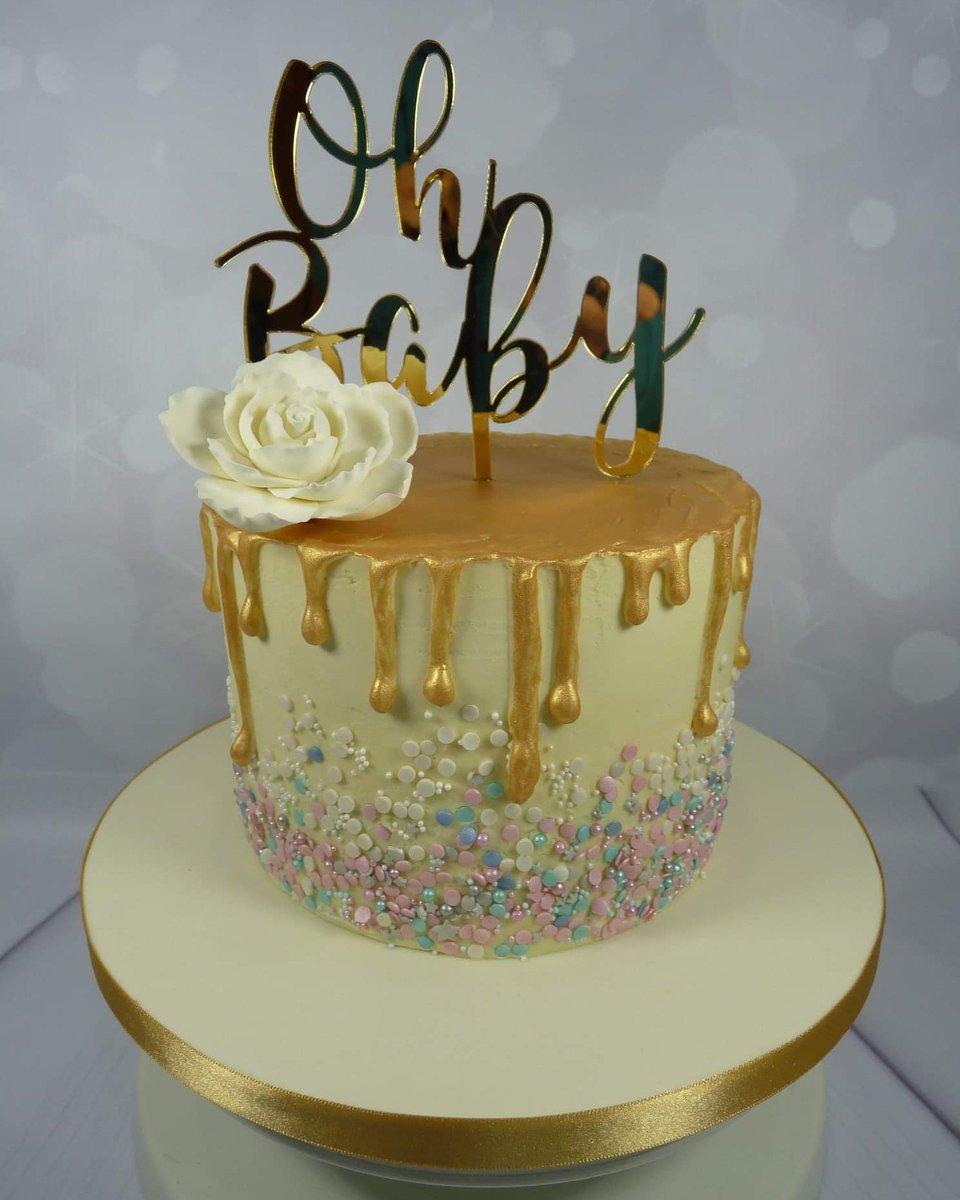 Gold Drip Baby Shower Cake with pink, white and blue
