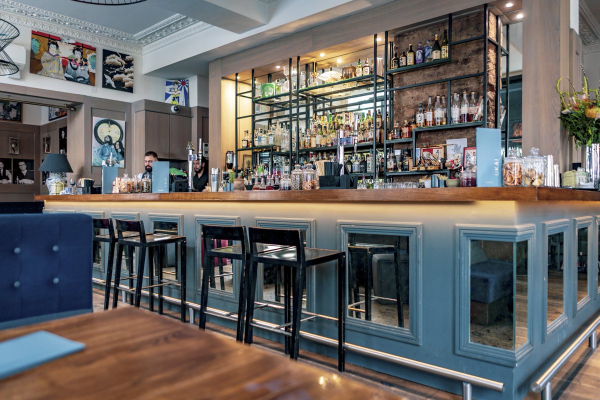 Take a seat at our bar to watch our talented bartenders work their magic!