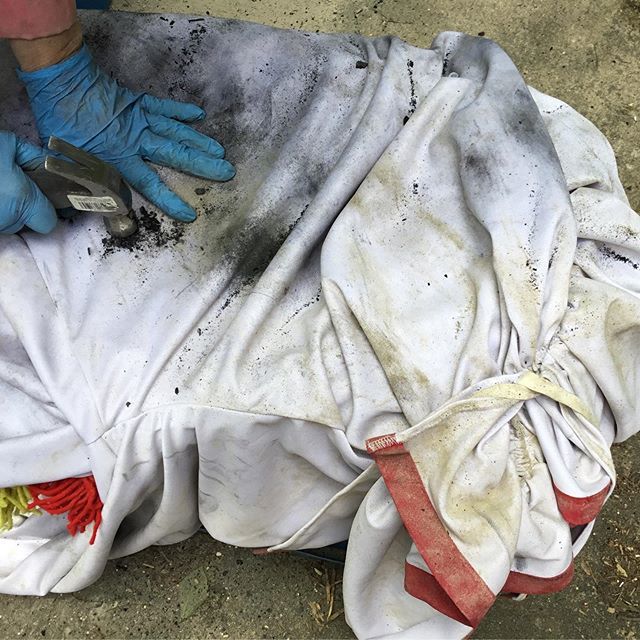 A quick look at #process. This “Ode to #Twisty” commission piece is distressed in a variety of ways. One of those is to burn wood and vigorously apply not only the resulting ash but also the remaining embers to the fabric, and grinding those in often requires the use of a ha…