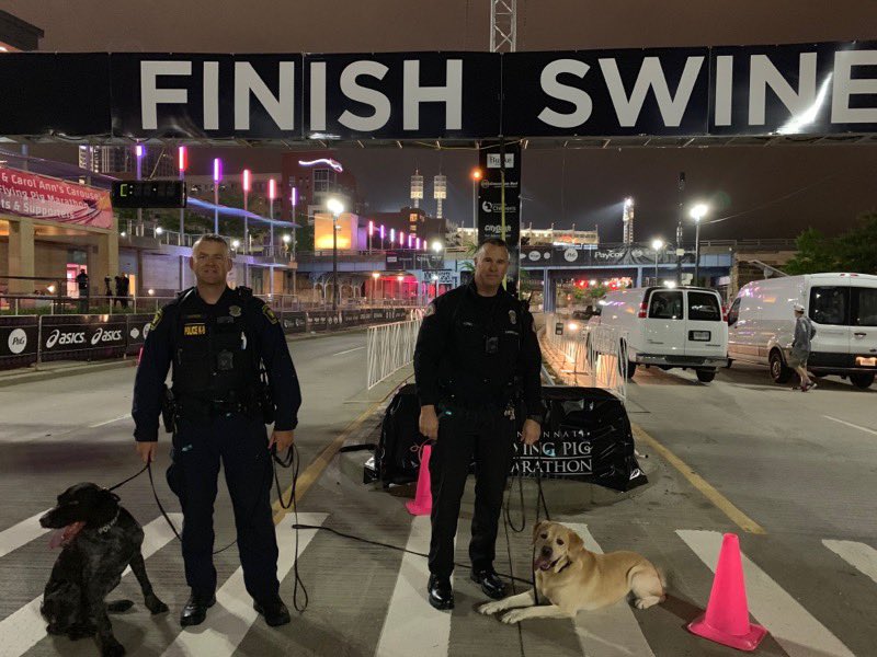 UCPublicSafety's tweet photo. Officer Long and #Dozer worked with @CincyPD’s Officer Lawson and Mauser to keep the #FlyingPigMarathon safe this morning. https://t.co/pbJjlZP9JZ