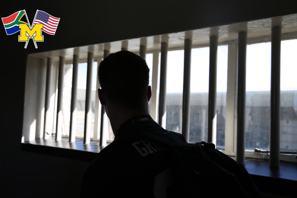 UMichFootball's tweet image. Another day in 🇿🇦, another series of special memories.

Our morning began with a ferry ride to a World Heritage Site, Robben Island. The island is known for housing Nelson Mandela for 18 of his 27 years in prison, but has held those isolated and banished by society for centuries.